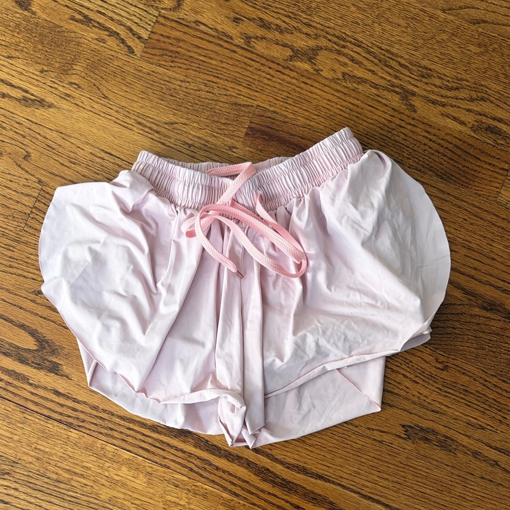 3/$15 Light Pink girls “butterfly shorts” size 130/L